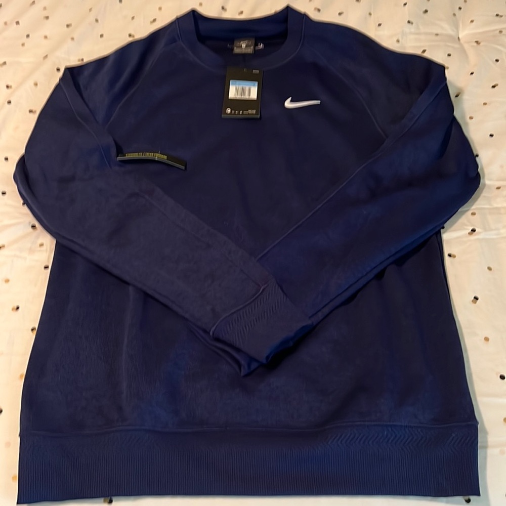 Nike sweatshirt size medium. Brand new with tags in dark blue.